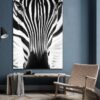 Zwart wit kunstfotografie zebra met betoverende ogen