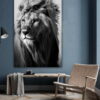 Black and white photo of a lion in the wilderness