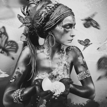 Black and white artwork: woman with butterflies