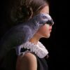 Baroque portrait of a girl with a parrot