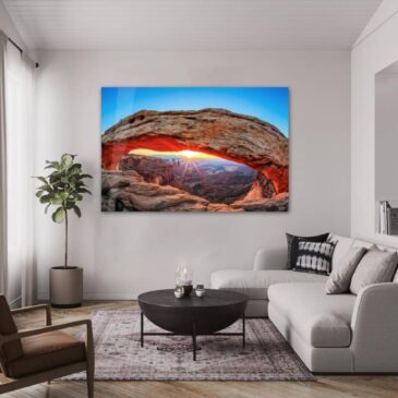 Work on the wall of Mesa Arch in Utah